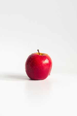 Red apple isolated on white background, shallow depth of field, selective focus