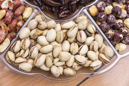 Background from various kinds of nuts almond, hazelnut, cashew, Brazil nut Nuts are differentの写真素材