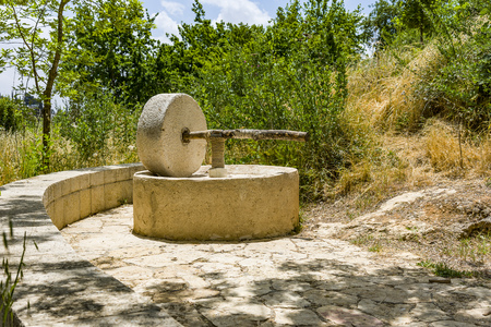The millstone, olive oil press squeeze out olive oilの写真素材