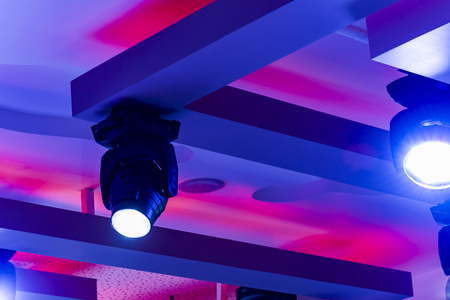 bar ceiling discoEmpty Night Club Lit by Colored Spotlightsの写真素材