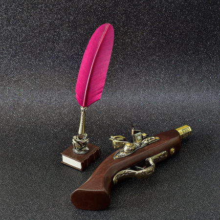 Sheet of retro pen. Pen inkwell and gun on a black background.