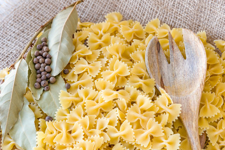 some farfalle pasta forming a background pattern pasta bows