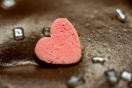 Small lovely little cake decorated with chocolate letters and littl hearts Pink little chocolate...