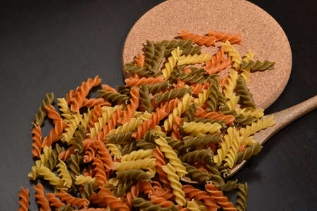 Three Colors Rotini Pasta. Twisted colored pasta in Italy.の写真素材