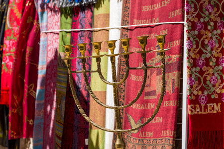 Israeli seven-branched candlestick against the background of the Carpets Jerusalem.