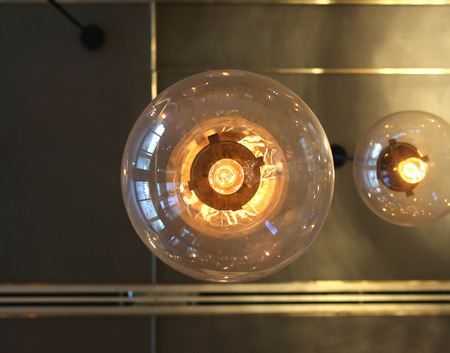 Modern electric lamps hanging on the ceiling, under view