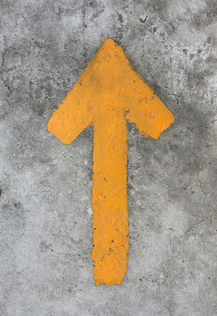 The Yellow arrow on floor street background