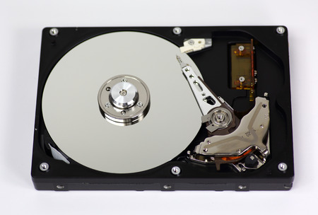 Harddisk drive (HDD) with top cover open isolated on white background