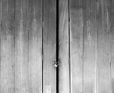Door wood with key locked, Black and white toneの写真素材