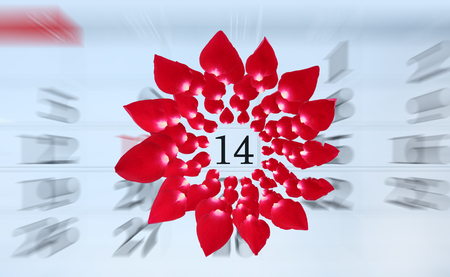 Zoom in Calendar page with pink petals rose on February 14 of Saint Valentines day.の写真素材