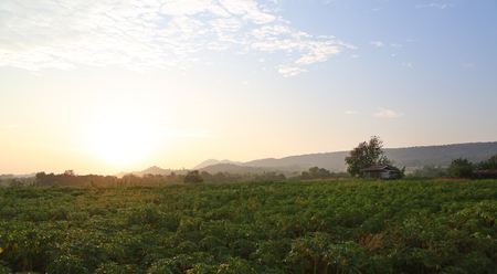 A Sunset over hillsの写真素材