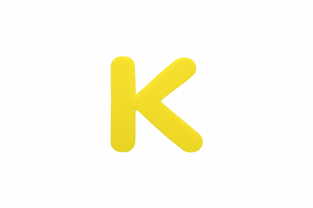 Alphabet letter K symbol of sponge rubber isolated over white background.
