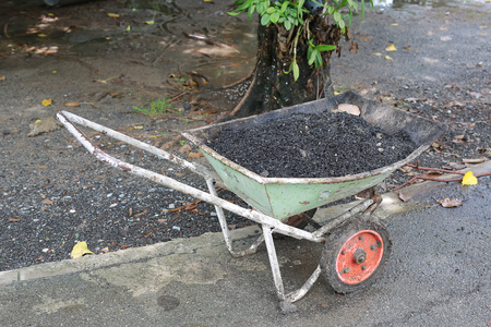 Fresh asphalt in metal cart ready to useの写真素材