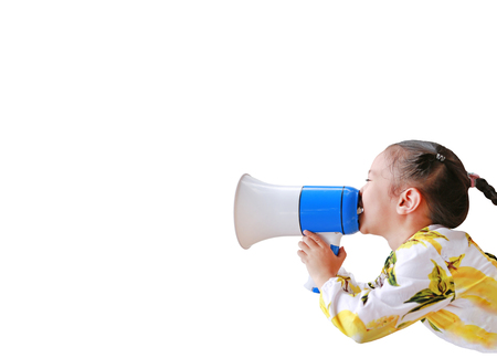 Asian little girl announce by megaphone isolated on white background with copy space. Communication concept. Side view.の写真素材