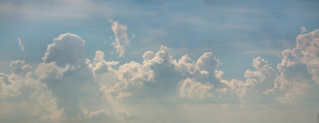Puffy Cloud on the blue sky background.