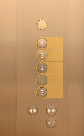 Elevator buttons on panel with blank label.の写真素材