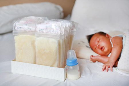 Bottle of mother breast milk. Breast milk storage.の写真素材