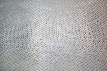 Perspective of diamond metal plate.