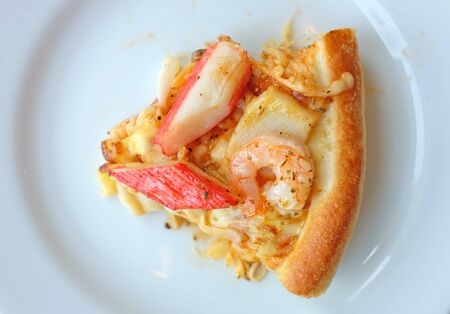 Seafood pizza in white plate.の写真素材