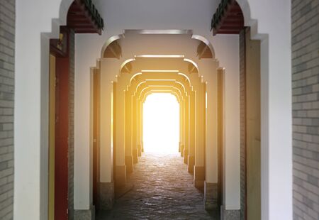 Corridor walkway in the building with sunlight through.の写真素材