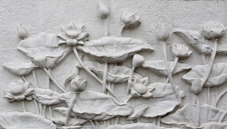 The Sculpture lotus of native thai style decorative on the wallの写真素材