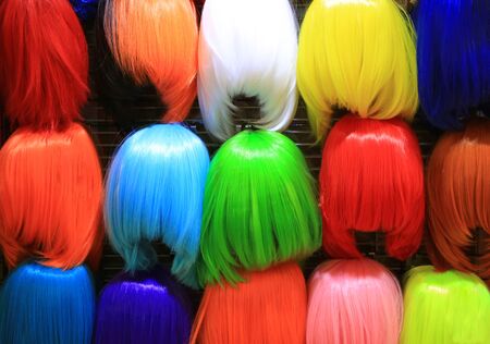 Colorful wig accessories. Sales at the market. Different wigs for women.の写真素材