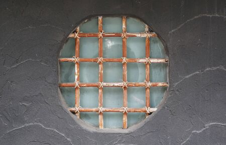The beauty of Japanese decorative design window on the abstract gray cement wall