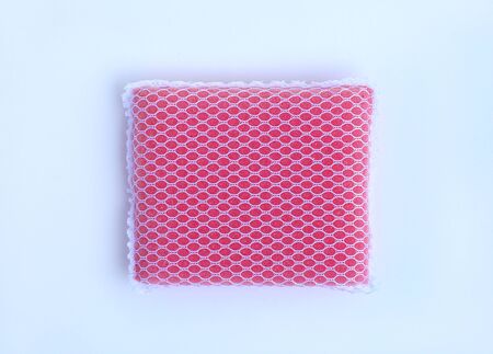 sponge for washing dishes on white backgroundの写真素材