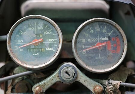 Close up of old motorcycle speed meter