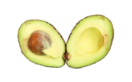 Avocado cut in half isolated on white background