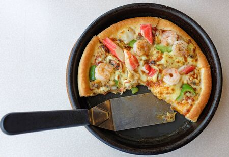 Seafood pizza in plateの写真素材