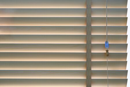 Wood blinds or curtain by the window.の写真素材