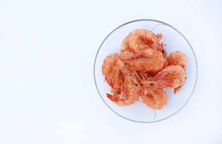 Top view Fried Shrimp in clear plate with copy space on white background.の写真素材