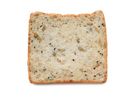 Sliced whole grain bread with seeds isolated on white background. Top view.