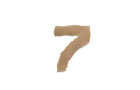 Arabic number symbol isolated over white background. English flat brown torn paper number 7の写真素材