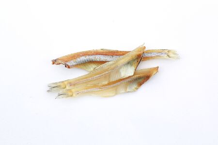 Macro image of Small dried fish isolated on white background.の写真素材
