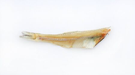 Macro image of Small dried fish isolated on white background.