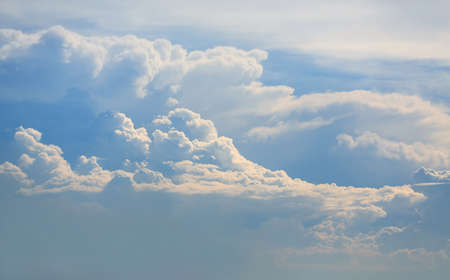 Beautiful blue sky with white fluffy cloud background