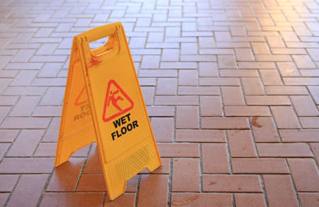 Beware of slippery floors. Caution wet floor warningの写真素材