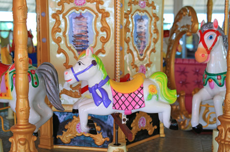 Horses on a carnival Merry Go Roundのeditorial素材