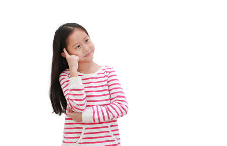 Asian little child thinking gesture and looking up on white isolated background with copy space