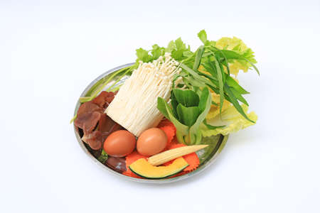 Vegetable sukiyaki set on white backgroundの写真素材