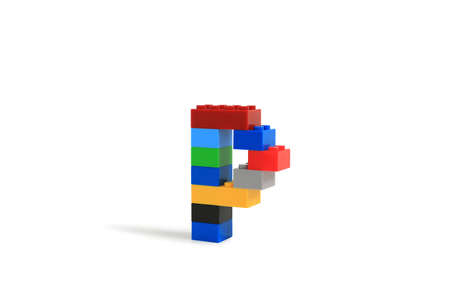 Alphabet letters P from colorful plastic brick block constructor isolated on white background.の写真素材