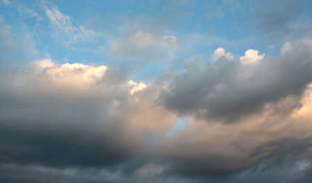 Dark storm clouds on sky at evening background