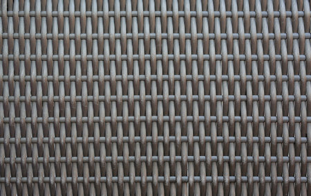 Old weave plastic wicker pattern background.