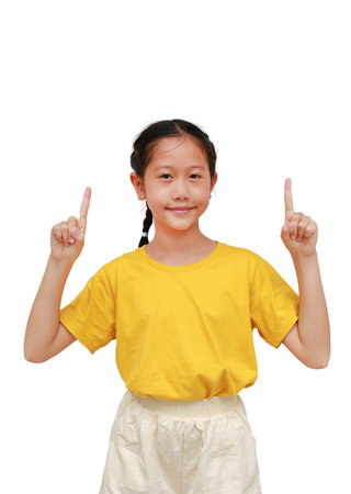 Portrait of Smiling Asian young girl pointing up two forefinger on white isolated studio background.