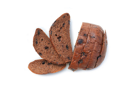 Bread sliced with chocolate chips isolated on white studio background.の写真素材