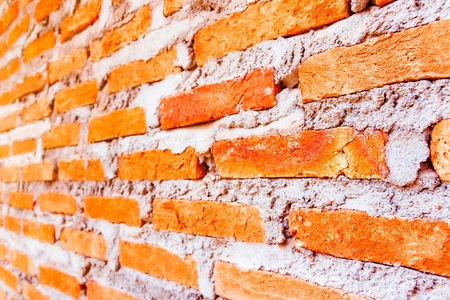 Red brick wall, tilt. selective focusの写真素材