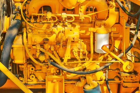 Old yellow diesel engine detailsの写真素材