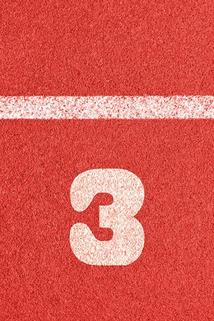 Start track. Lanes 3, number three of a red racing track.の写真素材